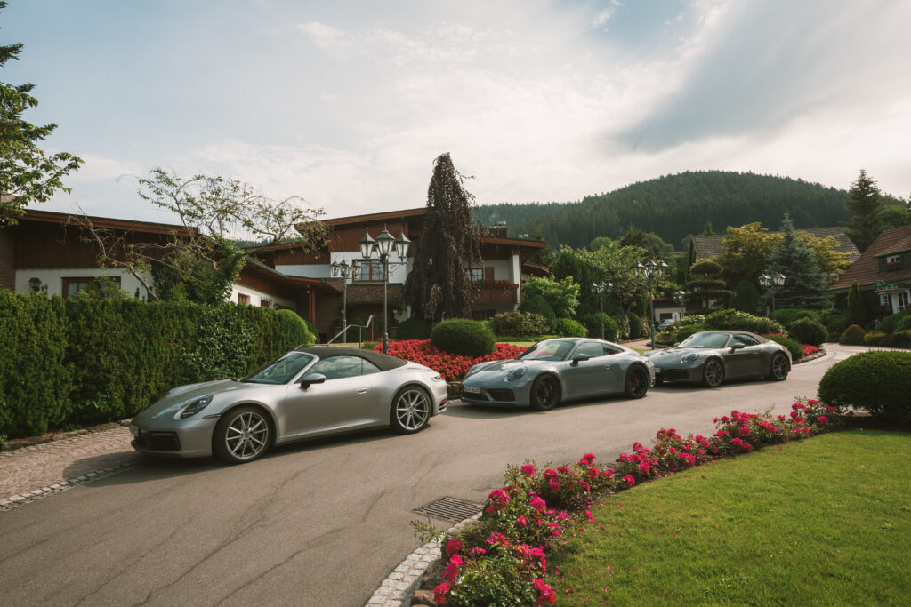 Porsches are parked at the entrance to the Bareiss Hotel in the Black Forest in Germany